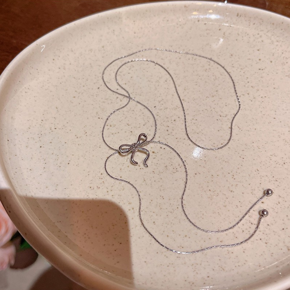 リボンデザインロングネックレス