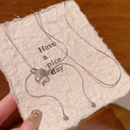 リボンデザインロングネックレス